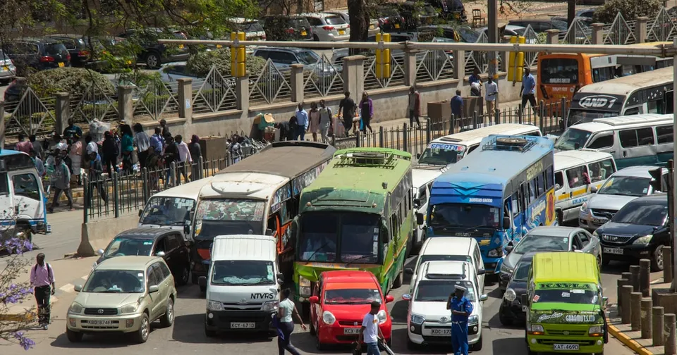A person holding a smartphone with Google Maps open, showing a route planned by Gemini