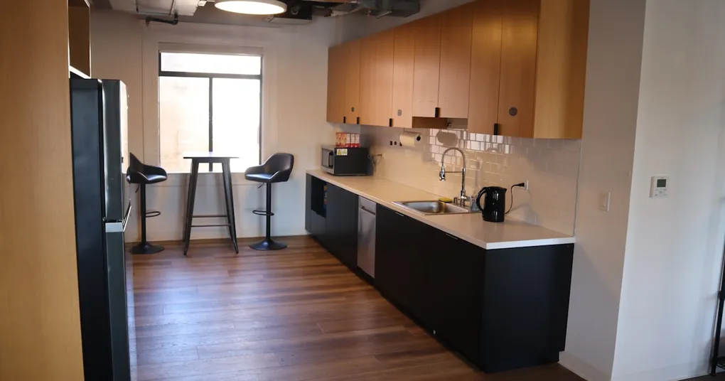 A futuristic illustration of artificial intelligence replacing human developers at work