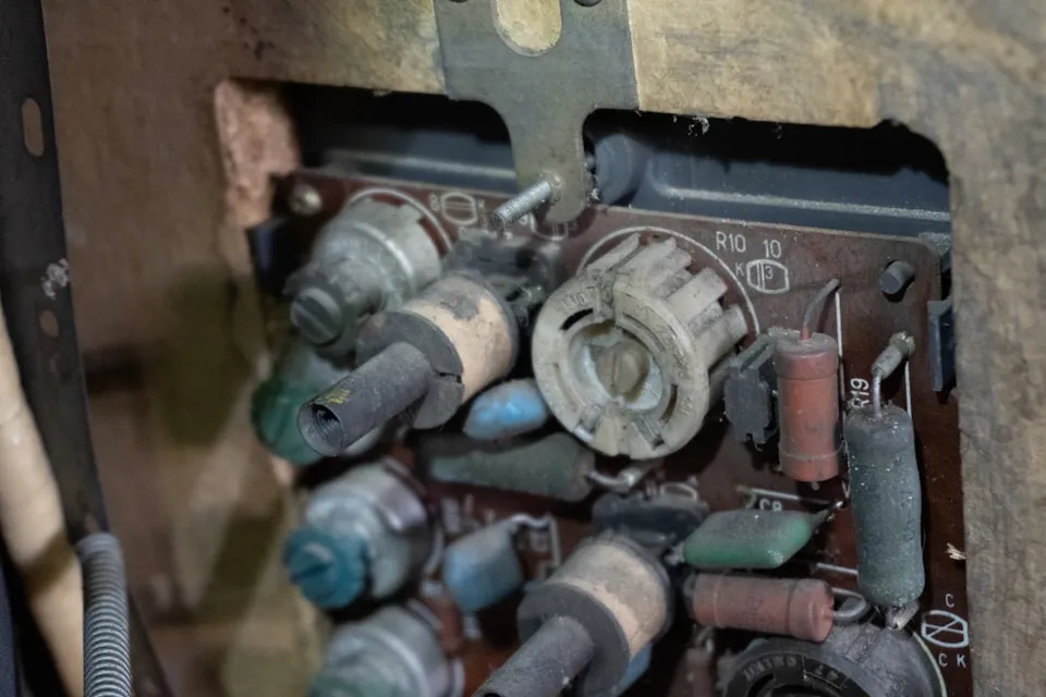 A photo of a person holding a circuit board with a Nvidia chip, representing innovation and technology.