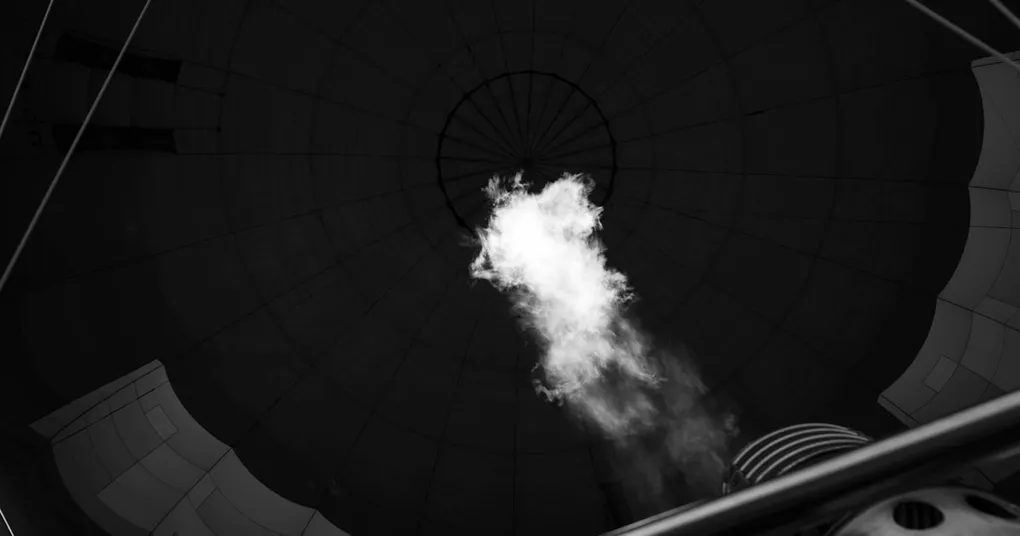 A photo of a scientist working with a plasma reactor, symbolizing innovation in rare earth element production