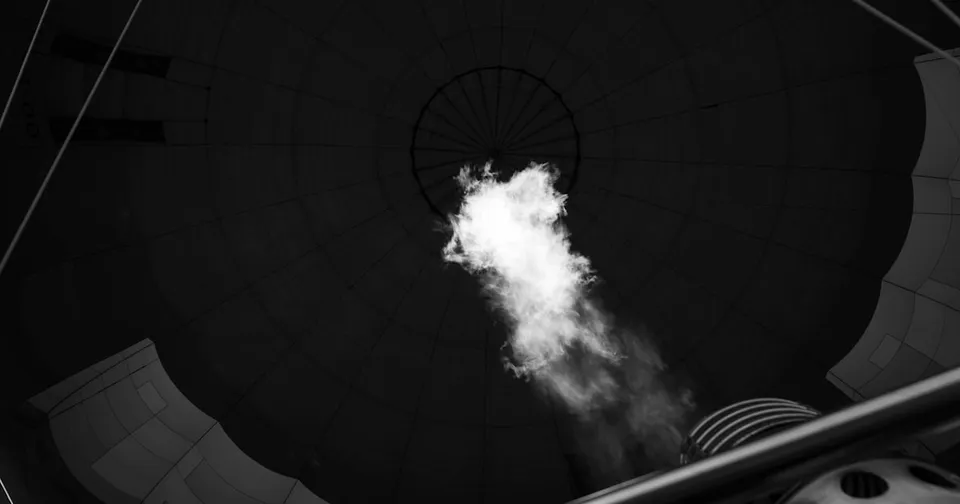 A photo of a scientist working with a plasma reactor, symbolizing innovation in rare earth element production