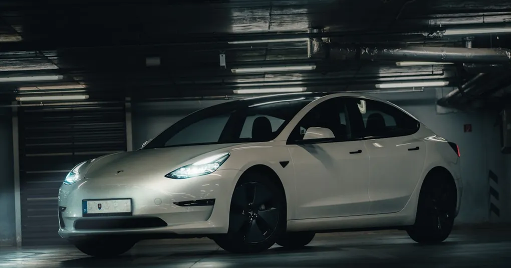 A photo of a Volkswagen ID.4 electric vehicle with a red cancel symbol over it, symbolizing the end of its production in the US